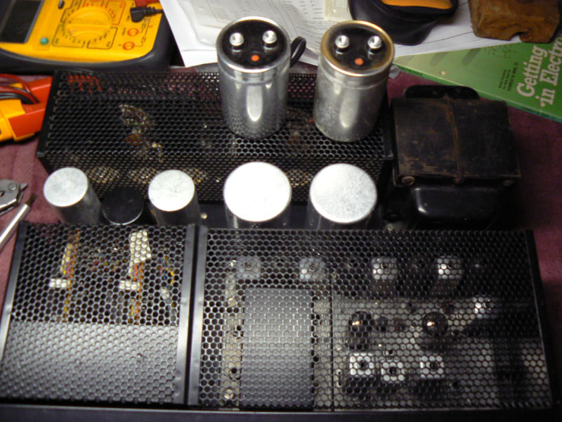 large-electrolytic The two large screw-terminal type filter capacitors (new parts installed, old parts with terminals shown).